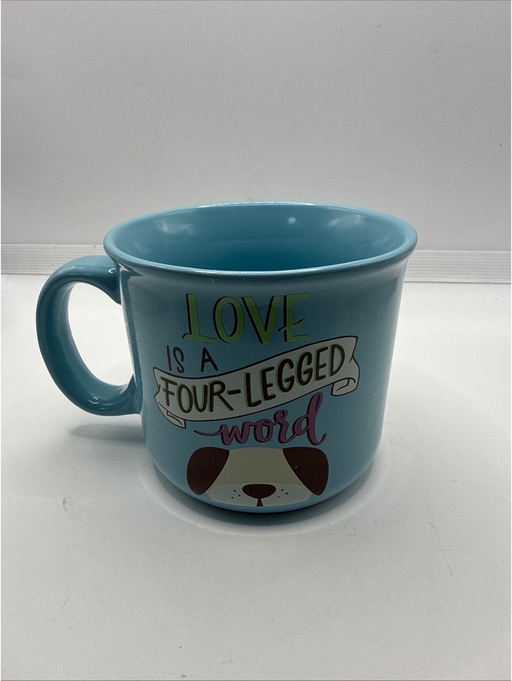 AngelStar Blue Ceramic Mug with Dog Design and 'Love is a Four-Legged Word' Text